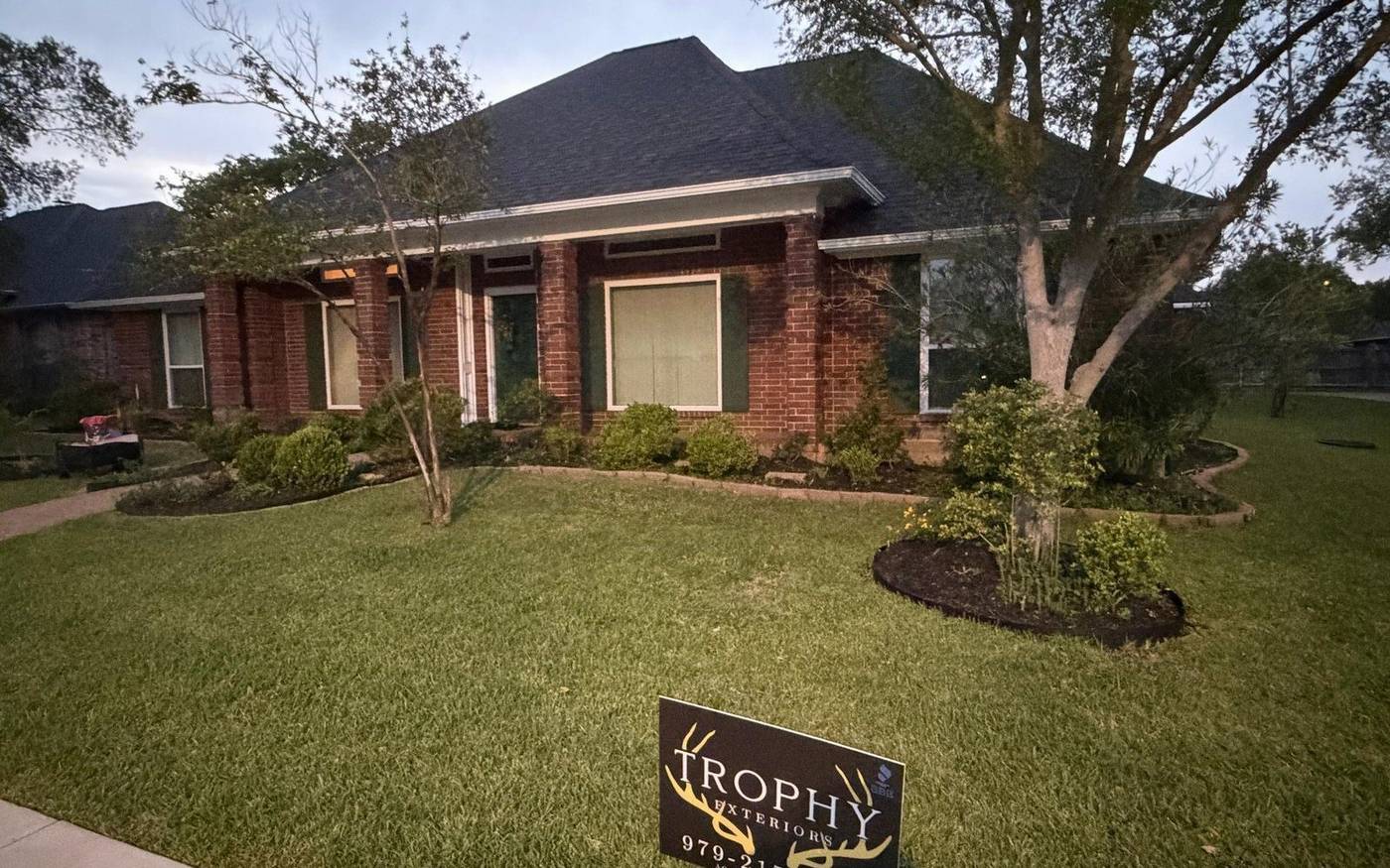 Trophy Exteriors roofing crew on a College Station job site