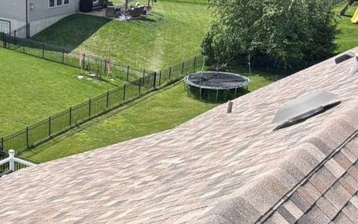 New architectural shingle roof by Trophy Exteriors in St. Louis County